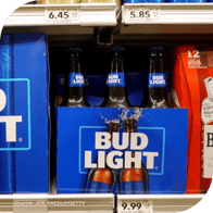 a six-pack of Bud Light sits on a grocery store shelf. Source: Joe Raedle/Getty