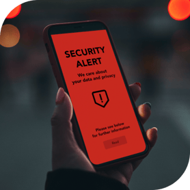 a smartphone glows read with a security alert reading, "We care about your data and privacy. Please see below for further information."