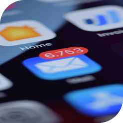 The email icon on a smartphone shows 6,753 unread messages