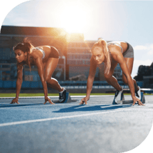 Two people at the starting line of a race